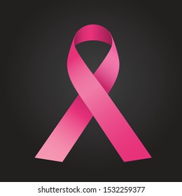 Pink ribbon on black background. Breast cancer awareness symbol.