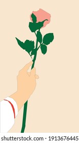 Una rosa rosa rosa en una mano con una pulsera blanca y roja 