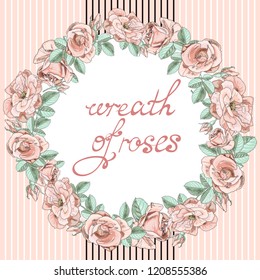 Pink roses in a round wreath.