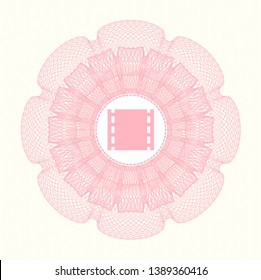 Pink rosette or money style emblem with film icon inside