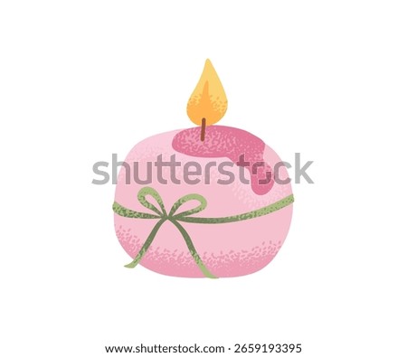 Pink round candle with a bow and dripping wax. Decorative candle for spa, relaxation, romantic interior, holiday decor and meditation.