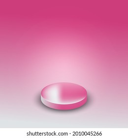 pink round podium There is reflection from the spotlight.