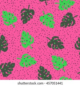 Pink seamless pattern with green tropical palm leaves and dark dots.  Vivid vector illustration with jungle monstera leaf. Design for web, wallpaper, textile, fabric etc.