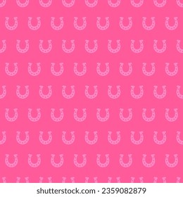 Pink seamless pattern with pink horseshoe