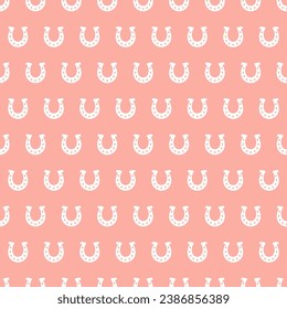 Pink seamless pattern with white horseshoe