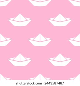 Pink seamless pattern with white origami boat