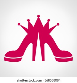 Pink shoes and a crown