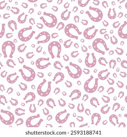 Pink silhouette of lucky horseshoe. Seamless vector pattern. Endless ornament. Isolated colorless background. Horse shoes in glamorous pink color. St. Patricks Day. Flat style. Repeating symbol.