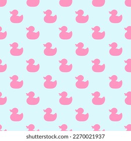 pink silhouette of rubber ducks on blue background.  Seamless pattern. Texture for fabric, wrapping, wallpaper. Decorative print.Vector illustration