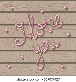 Pink small hearts on wooden background with handwritten text I love you. Vector wedding decoration concept. 