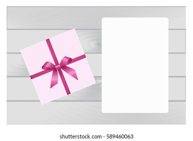 Pink Square Gift Box with Pink Bow and White Sheet of paper Isolated
 on Wooden Plank Background.  Has place for your text. Vector image.