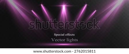Pink stage spotlights with glowing beams and dramatic lighting on dark background.
