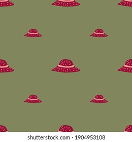 Pink summer headdress seamless pattern with simple panamas silhouettes. Olive green background. Graphic design for wrapping paper and fabric textures. Vector Illustration.