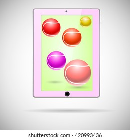 pink tablet with tennis balls