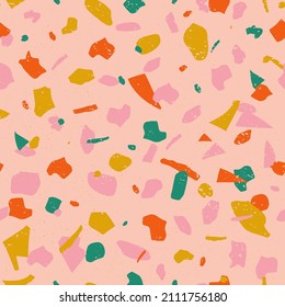 Pink terrazzo seamless pattern in trendy retro palette. Hand-drawn venetian flooring, natural granite stone pieces texture repeat. Vector illustration for textile, fabric wrapping paper, wallpaper etc