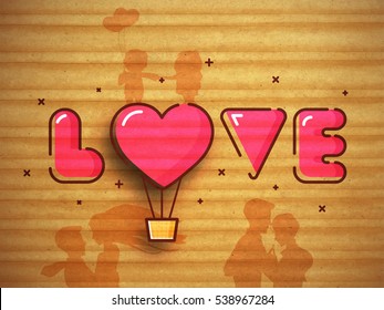 Pink Text Love with heart shaped hot air balloon on creative grungy background for Happy Valentine's Day celebration.