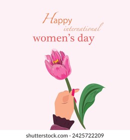 Pink Tulip in Hand. Happy international women's day.