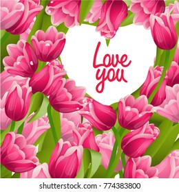 Pink tulips with green leaves as a card background and the text in the heart shaped frame