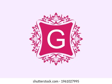 Pink vintage frame with G initial letter in the middle