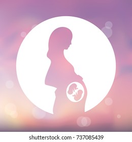 Pink watercolor silhouette of pregnant woman in a white circle. Multiple pregnancy. Monozygotic twins, embryos. Illustration for web or typography, brochure, flyer, poster. Blurred pink background