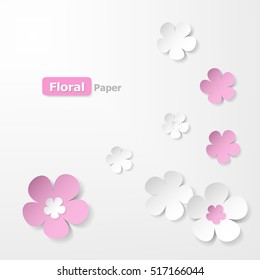 Pink and white floral paper background.