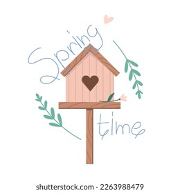 Pink wooden birdhouse in flowers with lettering Spring time, plant twigs and flowers