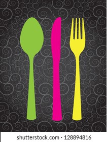 Pink,green and yellow cutlery over vintage background