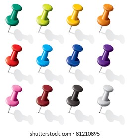 The pins of various colors on a white background with gray shadows.