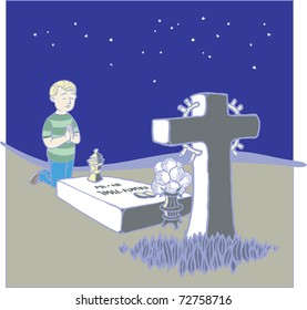 Pious boy prays at the tomb at night.