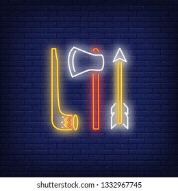 Pipe, tomahawk and arrow neon sign. Native American culture concept design. Night bright neon sign, colorful billboard, light banner. Vector illustration in neon style.