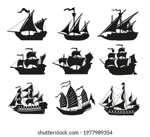 Pirate boats and Old different Wooden Ships with Fluttering Flags. Vector Set Old shipping sails traditional vessel pirate symbols garish vector illustrations.Black silhouettes collection set