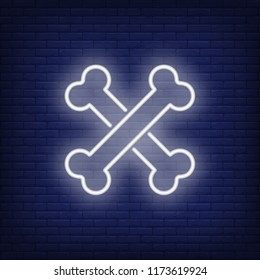Pirate symbol neon icon. Crossed bones on brick wall background. Halloween concept. Vector illustration can be used for street wall signs, billboards, nightlife.