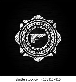 pistol icon with chalkboard texture