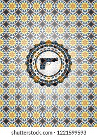 pistol icon inside arabesque badge. arabic decoration.