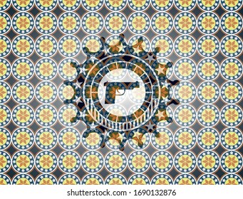 pistol icon inside arabesque badge. arabic decoration.
