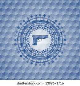 pistol icon inside blue emblem with geometric pattern background.