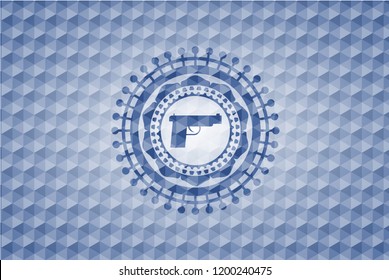pistol icon inside blue polygonal emblem.