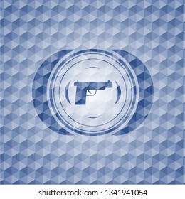 pistol icon inside blue polygonal emblem.