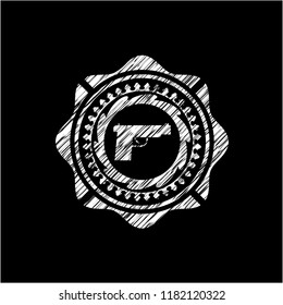 pistol icon inside chalk emblem