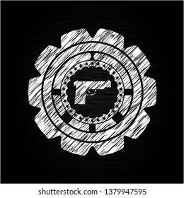 pistol icon inside chalkboard emblem on black board