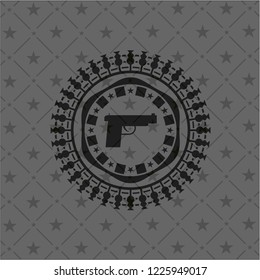 pistol icon inside dark badge