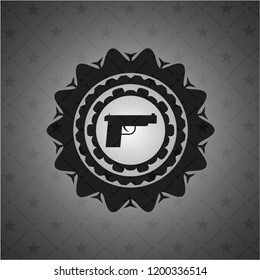 pistol icon inside dark emblem. Retro