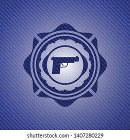 pistol icon inside emblem with jean texture