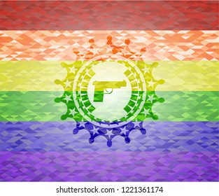 pistol icon inside emblem on mosaic background with the colors of the LGBT flag