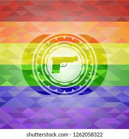 pistol icon inside emblem on mosaic background with the colors of the LGBT flag
