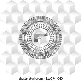pistol icon inside grey emblem with geometric cube white background