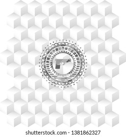 pistol icon inside grey emblem with cube white background