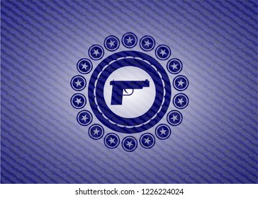 pistol icon inside jean background