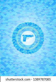 pistol icon inside light blue emblem with mosaic background