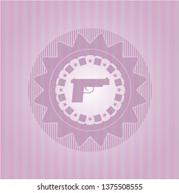 pistol icon inside pink emblem
